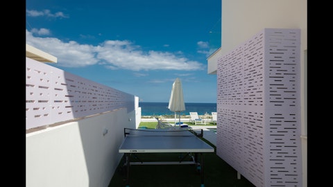 Play table tennis with sweeping sea views all around