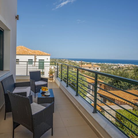 Enjoy views of the Aegean Sea from the private balcony