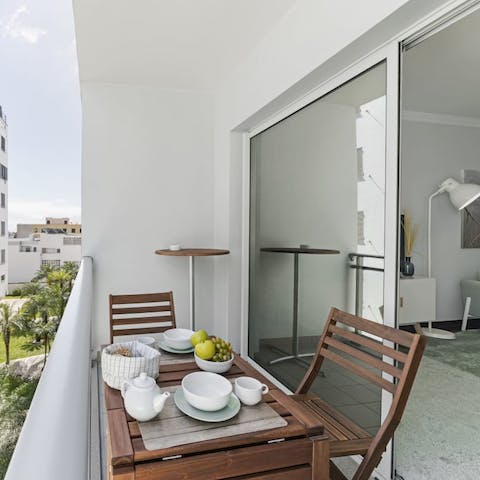 Enjoy some fresh, local produce from Mercado dos Lavradores for breakfast on the balcony