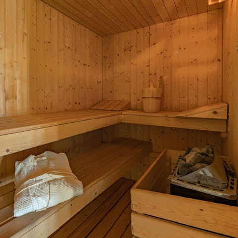 Relax and unwind in the private sauna