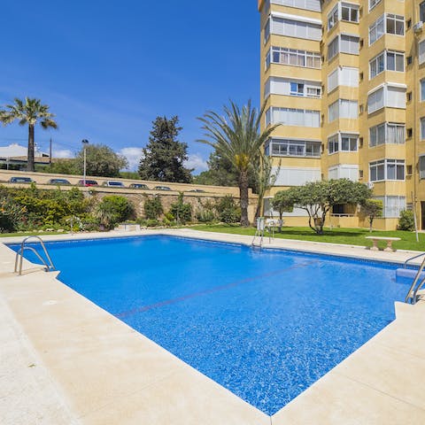 Take a refreshing dip in the communal swimming pool