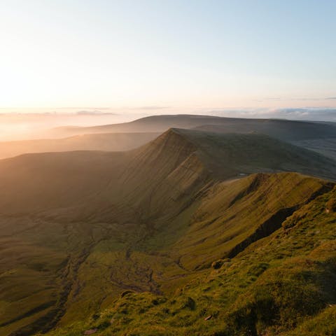 Go for a hike on Pen y Fan, in the Brecon Beacons National Park, a twenty-five-minute drive away