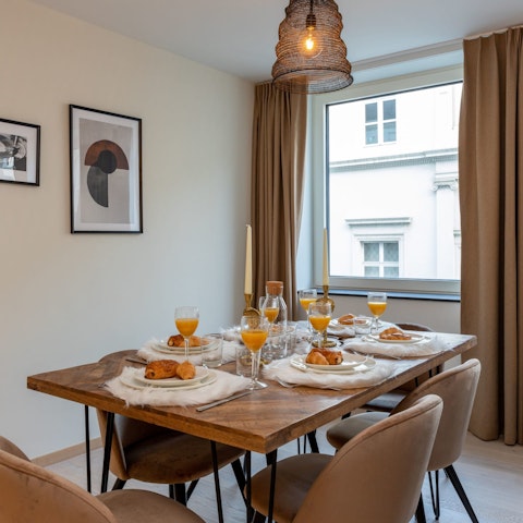Gather the group around the Scandi-chic dining table