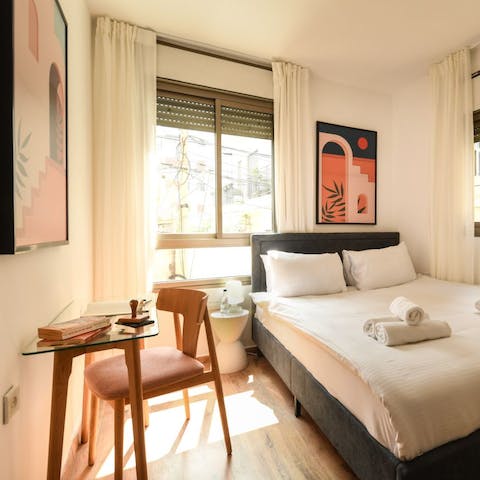 Keep on top of emails from the bedroom's dedicated desk space