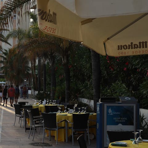 Grab dinner along Marbella's promenade, just moments away