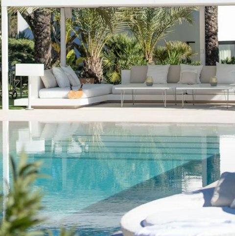 Emerge from the pool and get comfortable on the outdoor sofas