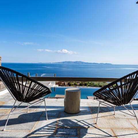 Admire the view of islands floating on the horizon from the first-floor balcony
