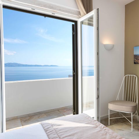 Step from bedroom to balcony or poolside through glass doors