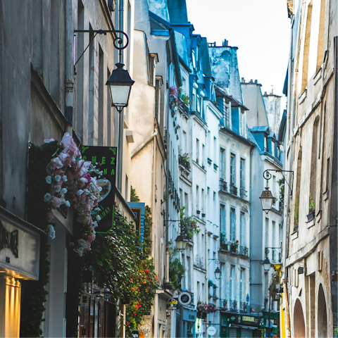 Wander through the cobbled streets of Le Marais, lined with galleries, vintage shops and cafes