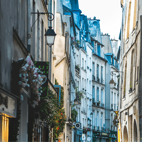 Wander through the cobbled streets of Le Marais, lined with galleries, vintage shops and cafes