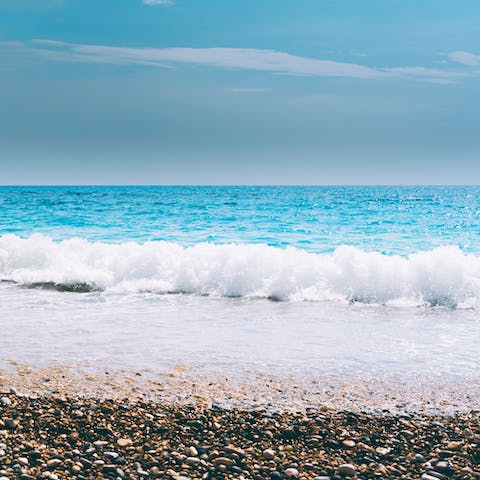 Walk to Kerasia beach and sink your feet into the crystal clear sea