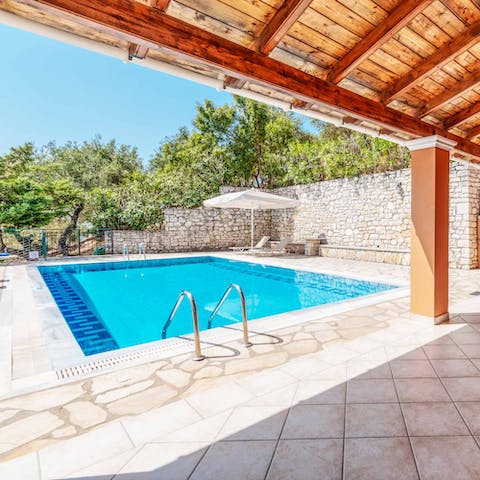 Cool off from the Greek heat with a refreshing dip in the private pool