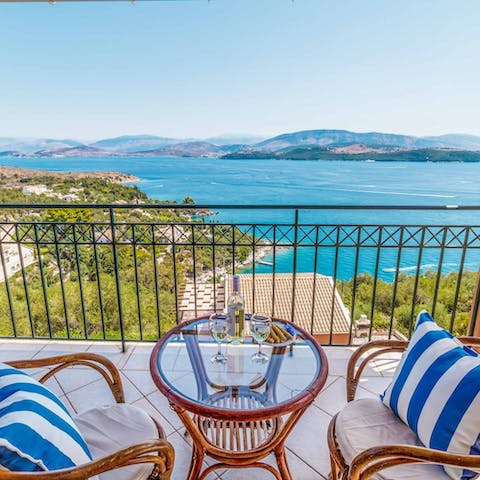 Enjoy a glass of wine as you drink in the sea views from the terrace