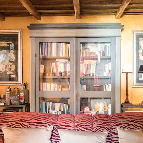 Pick a book from the bookshelf overflowing with volumes