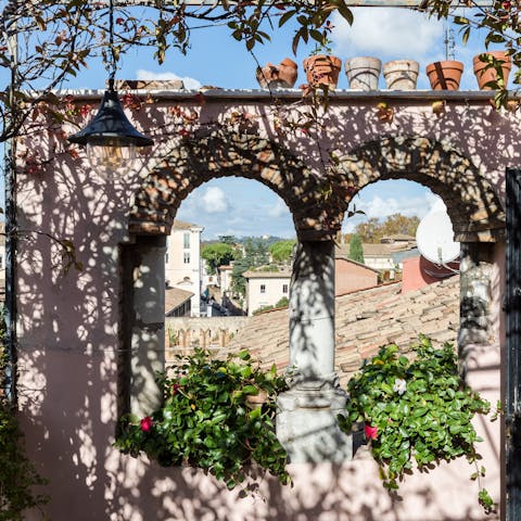 Take in  the views over Rome's rooftops from the sun-dappled terrace