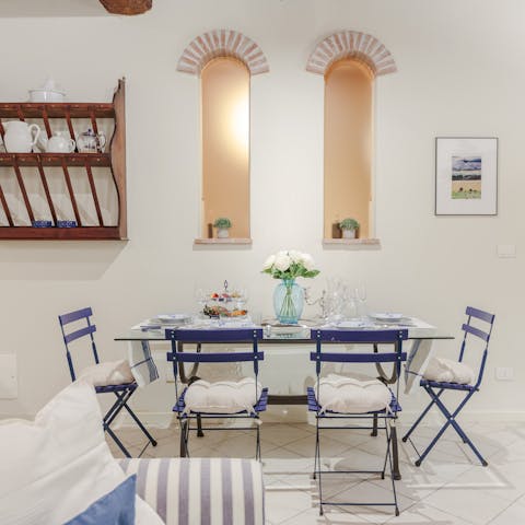 Begin the day with an espresso and cornetto for breakfast around the dining table