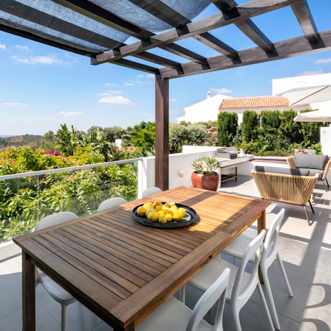 Dine alfresco on your private terrace for beautiful views of the Algarve