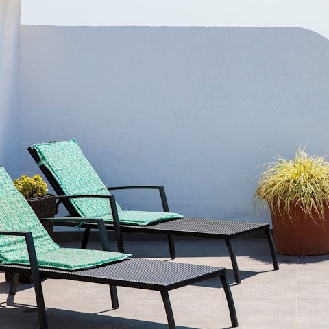 Soak up the sunshine on the roof terrace's loungers