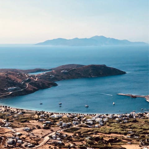 Stay just a ten-minute drive away from Livadi village and harbour