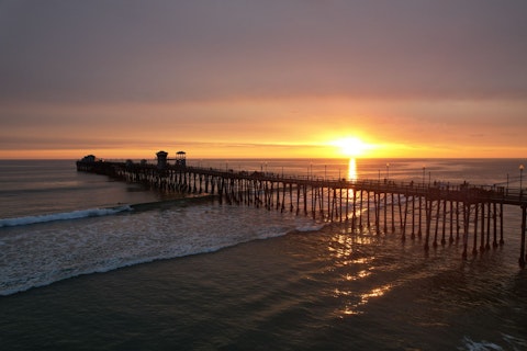 Stroll Oceanside Pier, one of the longest wooden piers on the West Coast, a fifteen-minute walk