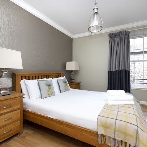 Unwind in one of the comfortable bedrooms after a day of exploring the city