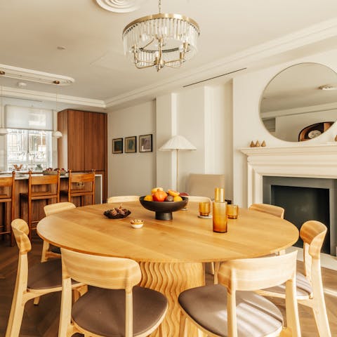 Gather around the generous dining table for meals