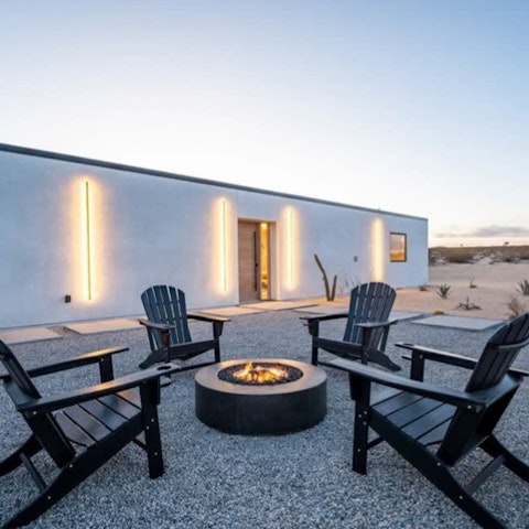 Warm up by the fire pit on a cool desert evening