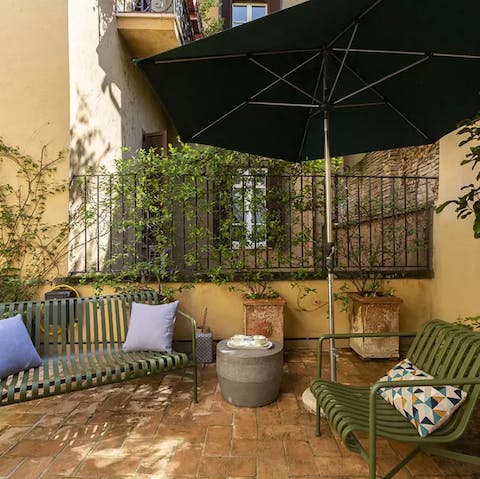 Pour yourself an aperitif and catch golden hour in the palazzo's terrace