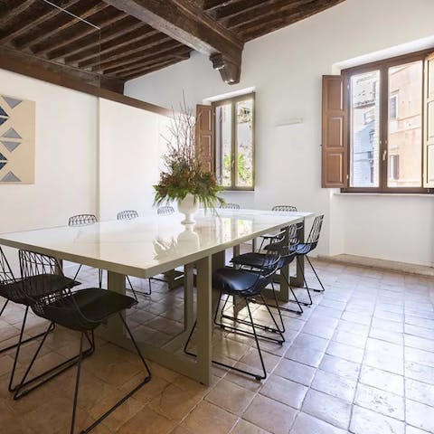 Throw open the shutters and enjoy a family feast in the sleek dining room