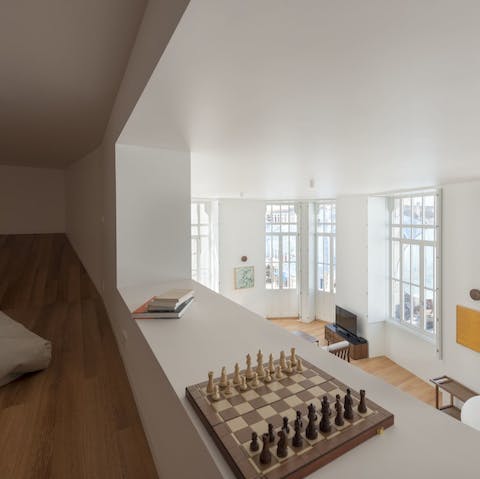 Play a game of chess on the mezzanine
