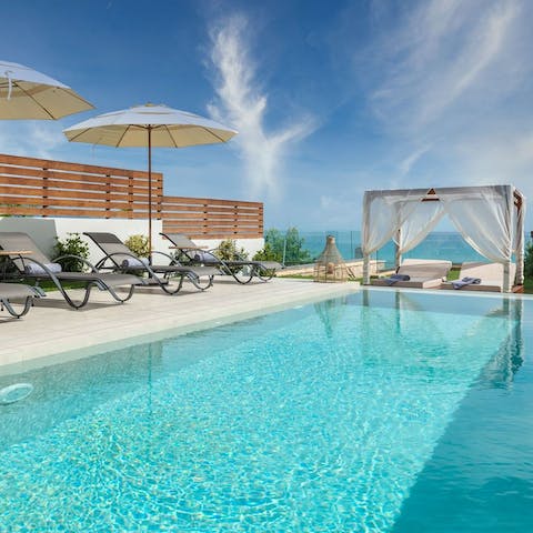 Swim in the pool to feel refreshed underneath the glistening sunshine