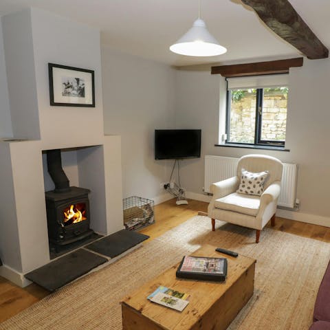 Warm up by the log burner after a walk in the Cotswold countryside