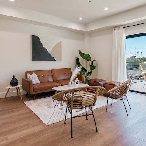 Sit back and relax on the sofa as the evening sun streams in through the sliding doors