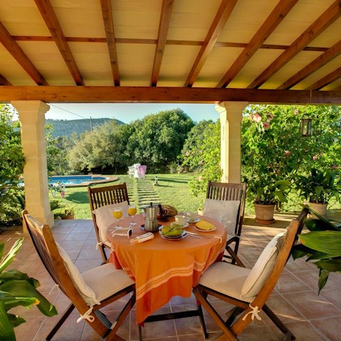 Dine alfresco in the garden – the covered terrace is the best spot for it