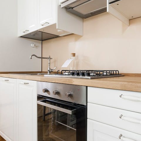 Prepare meals in the fully equipped kitchen