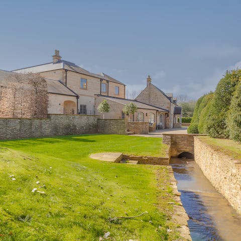 Wander the grounds and admire the flowing stream