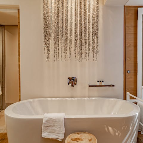 Treat yourself to a long soak in one of the freestanding tubs