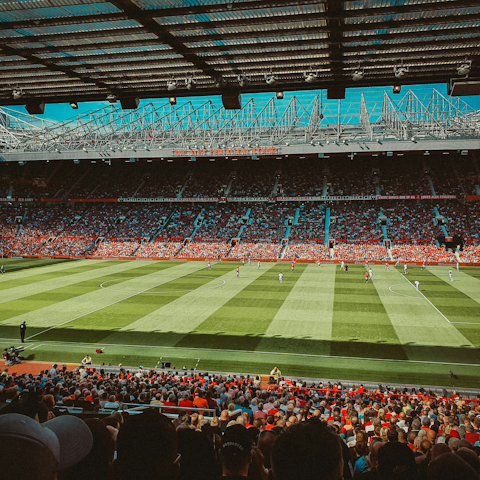 Catch a game at Old Trafford Stadium, a ten-minute drive away