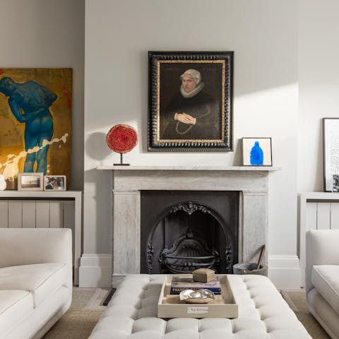 Take in the unique artwork and antiques masterfully dotted about the home