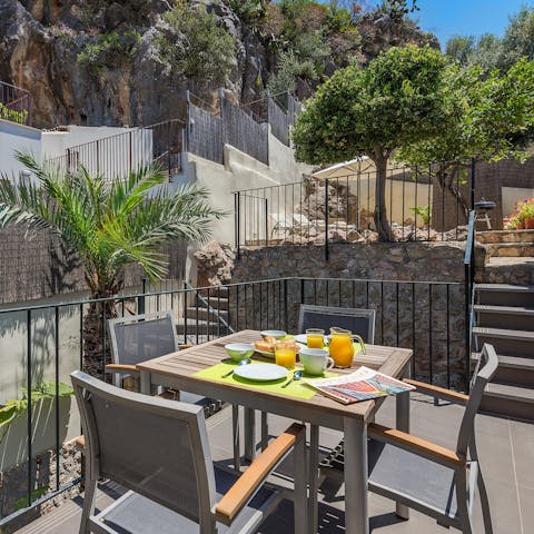 Start the day with a glass of fresh-squeezed OJ on the terrace