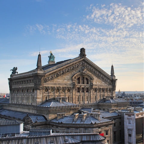 Enjoy a tour of the opulent Palais Garnier, a short walk away
