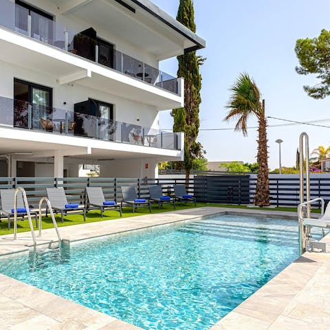 Lounge by the communal pool or cool off with a quick dip