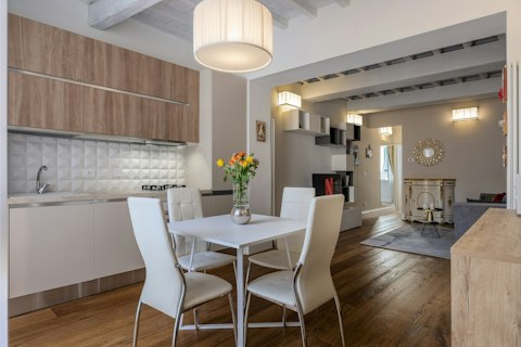 Gather with friends in the long living space for dinners