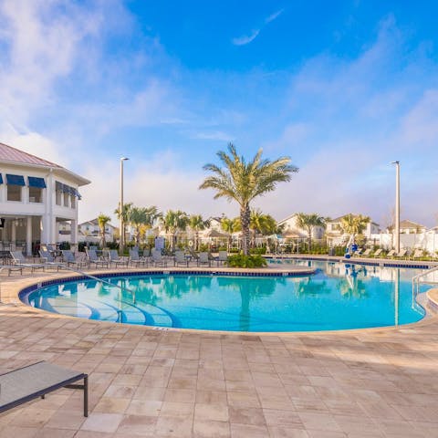Enjoy the resort amenities, including the sunny swimming pools