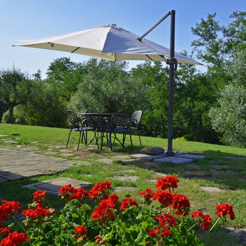 Serve up olives and fresh bread under the shade on your private patio