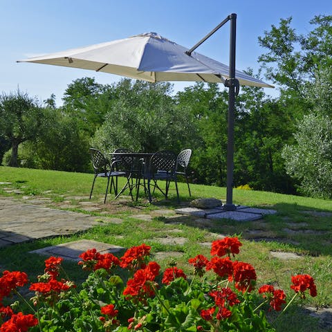 Serve up olives and fresh bread under the shade on your private patio