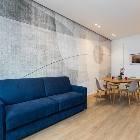 Relax on the comfy sofa with a glass of Italian red wine