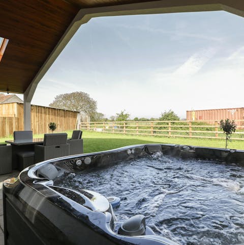 Hop in the hot tub for a soothing soak