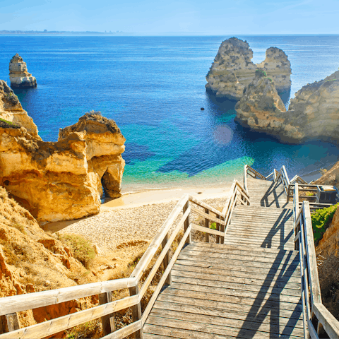 Sunbathe on the cliff-hugged Praia da Marinha, only 350 metres from home