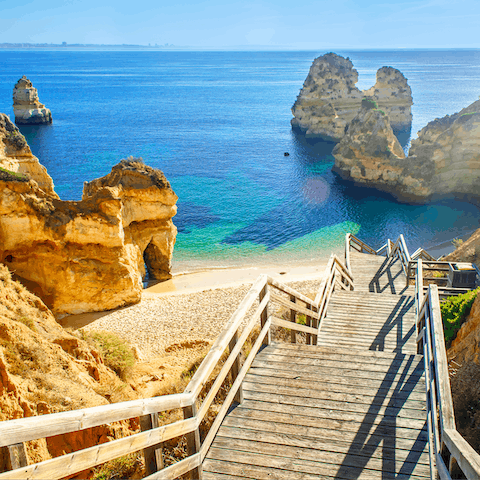 Sunbathe on the cliff-hugged Praia da Marinha, only 350 metres from home